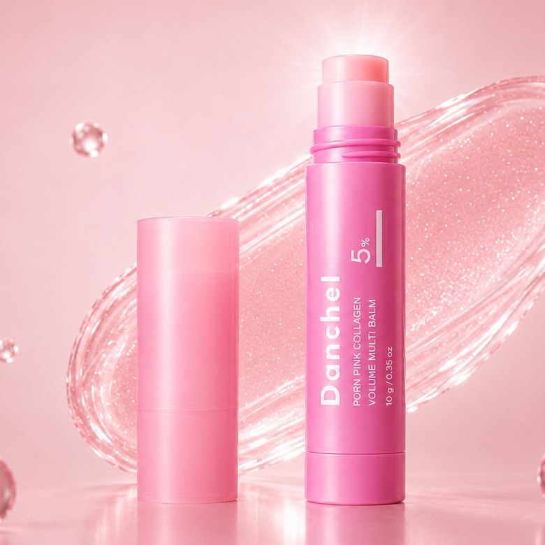 The Danchel Glow Stick with the pink balm twisted up, among floating droplets